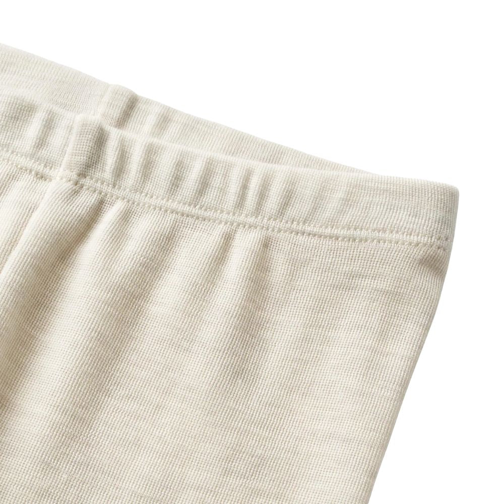 Wheat Legginsy wełniane dla dzieci Eggshell Melange
