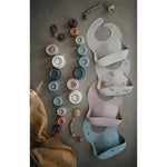 Mushie śliniak silikonowy Dinosaurs