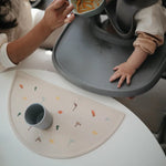 Mushie Podkładka silikonowa na stół Dinosaurs