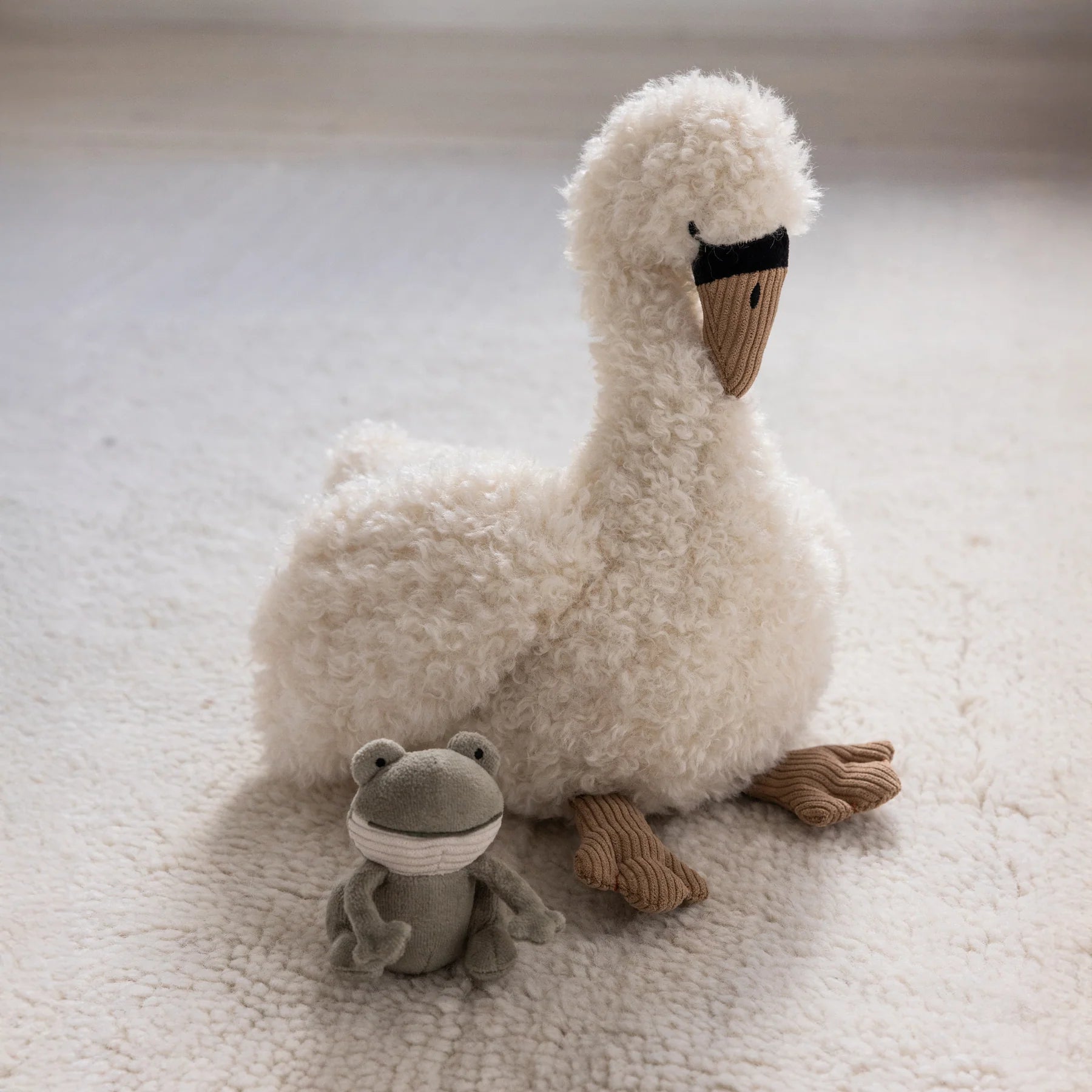 Sebra Przytulanka aktywizująca dla niemowlaka Łabędź Creamy White