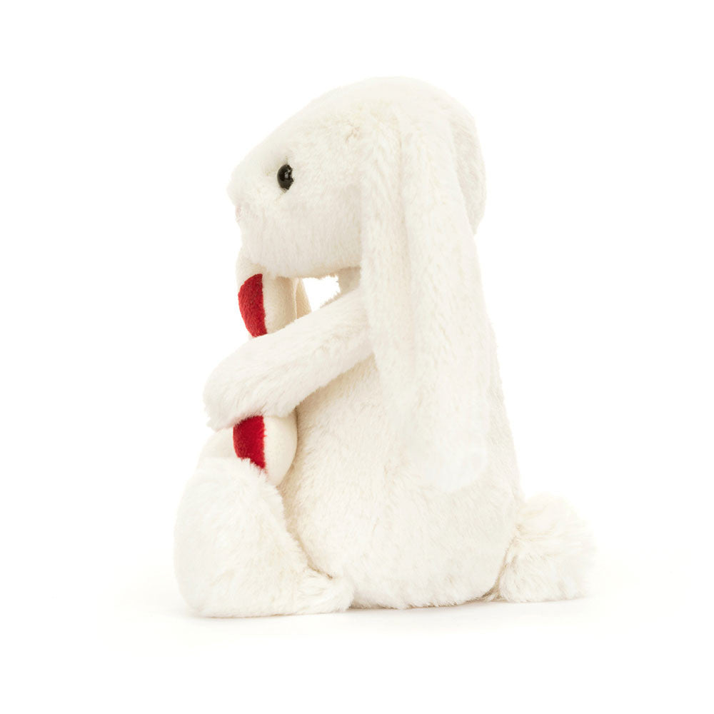 Jellycat maskotka wesoły króliczek z cukierkową laską 18 cm