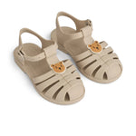Liewood Sandały dziecięce z przypinkami Bre Bear / sandy