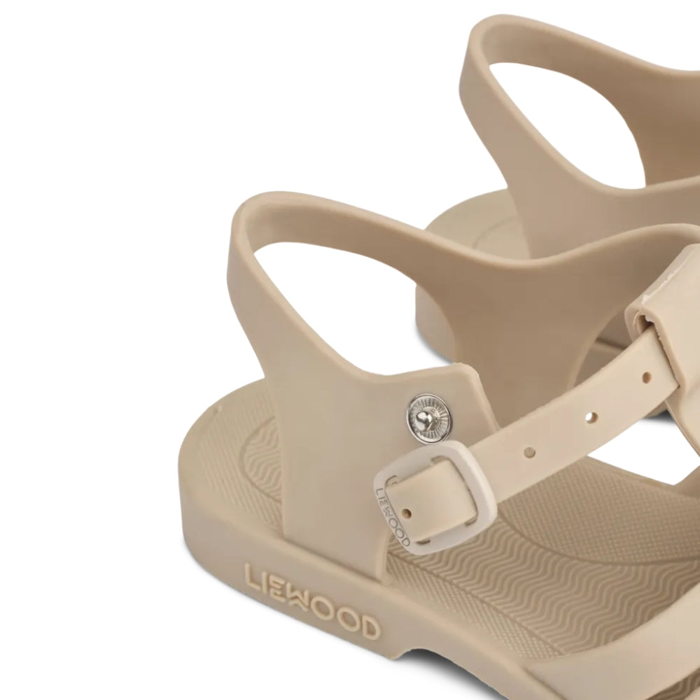 Liewood Sandały dziecięce z przypinkami Bre Bear / sandy