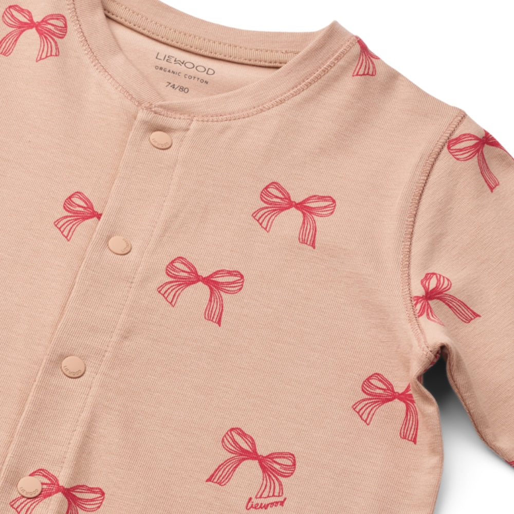 Liewood Piżama dla dziecka jednoczęściowa Birk Grow Printed Bows / Pale tuscany