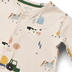 Liewood Piżama dla dziecka jednoczęściowa Birk Grow Printed Farmlife / Sandy