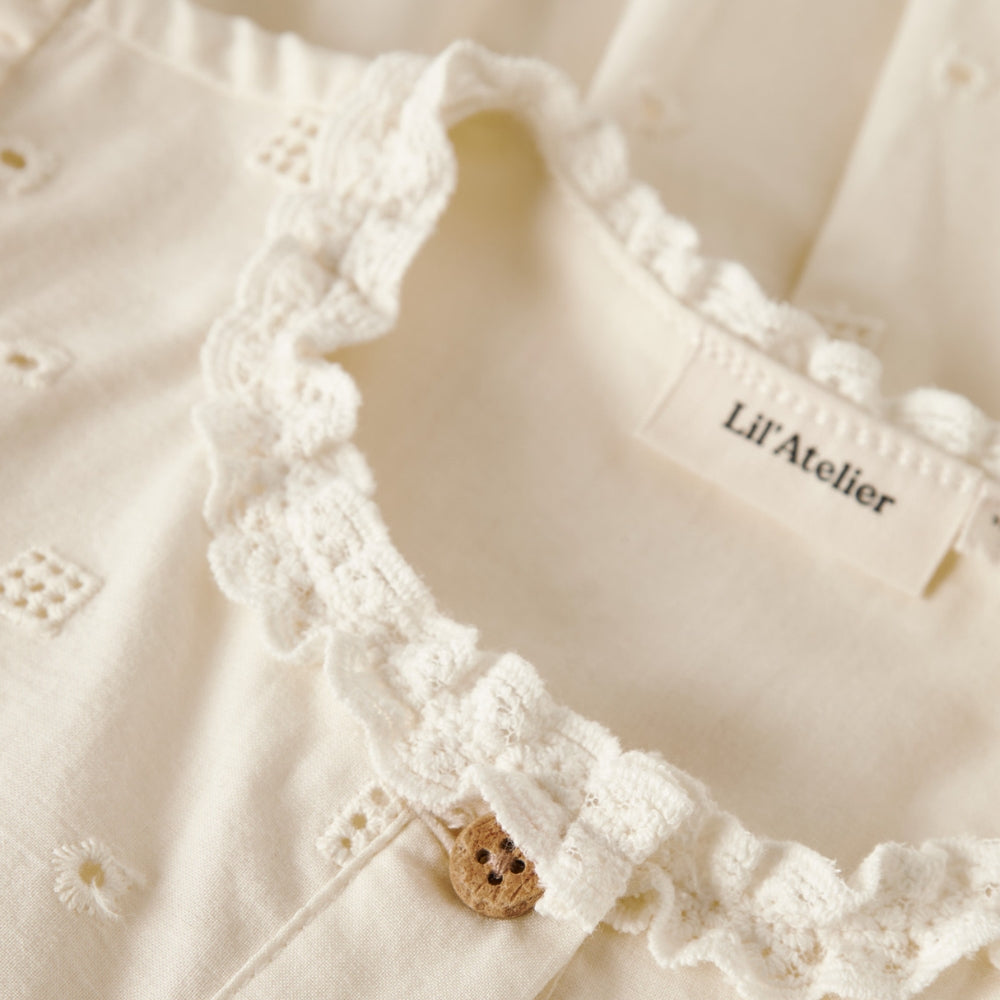 Lil’ Atelier Sukienka dla dziewczynki Coconut Milk NMFFLORES