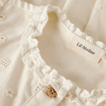 Lil’ Atelier Sukienka dla dziewczynki Coconut Milk NMFFLORES