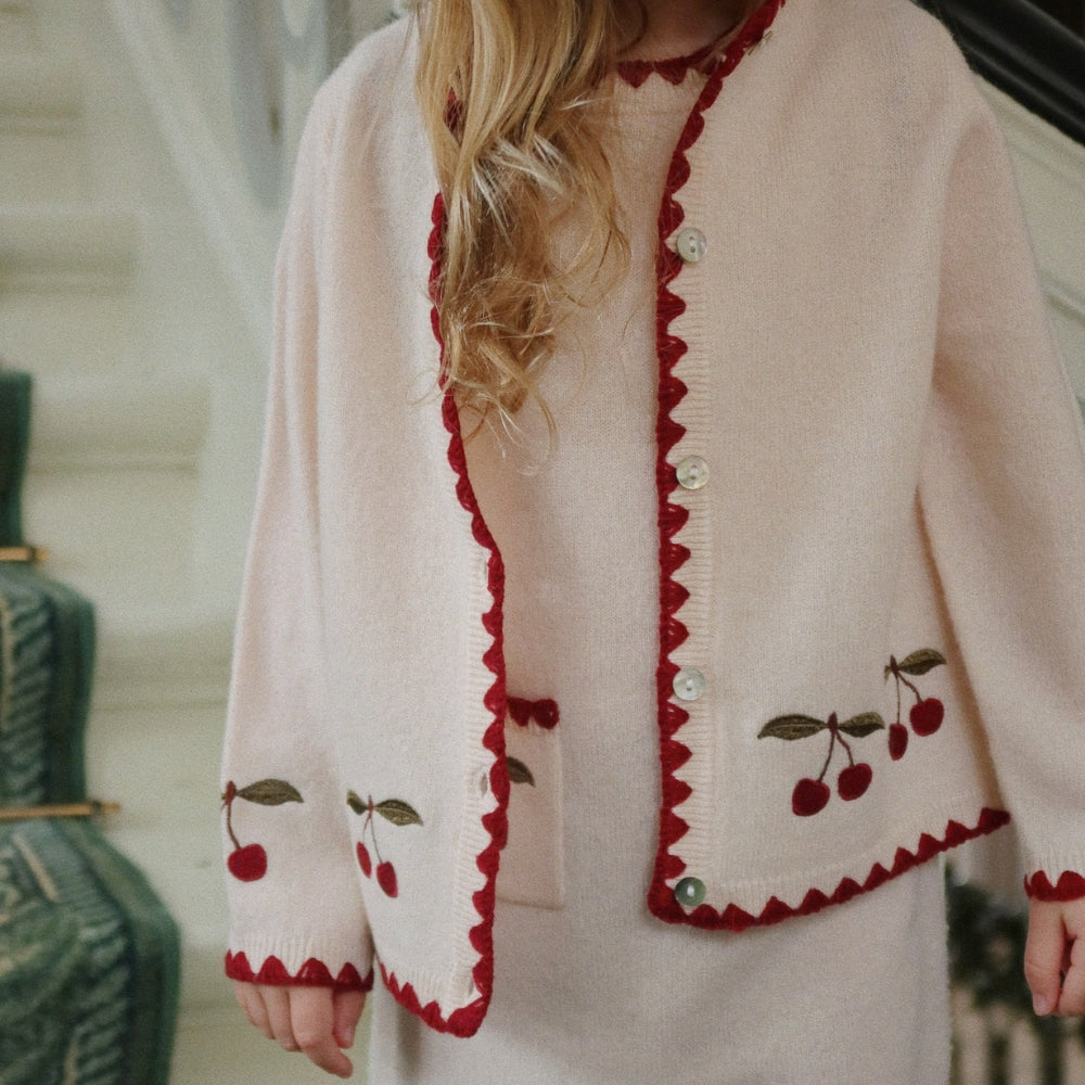 Konges Slojd Sweterek dla dziewczynki wełniany Colette Off White