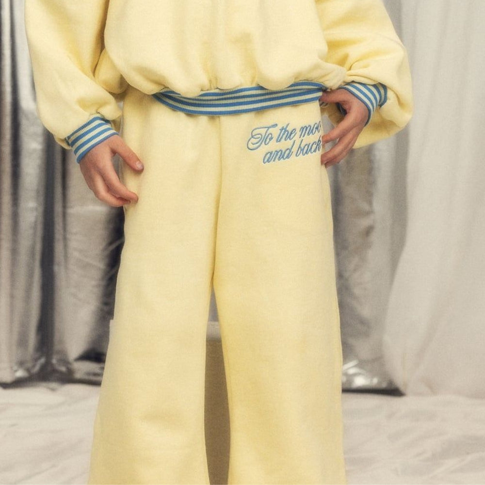 Mini Rodini Spodnie dla dziewczynki dzwony To the moon Yellow