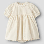 Lil’ Atelier Sukienka niemowlęca Coconut Milk NBFFLORES