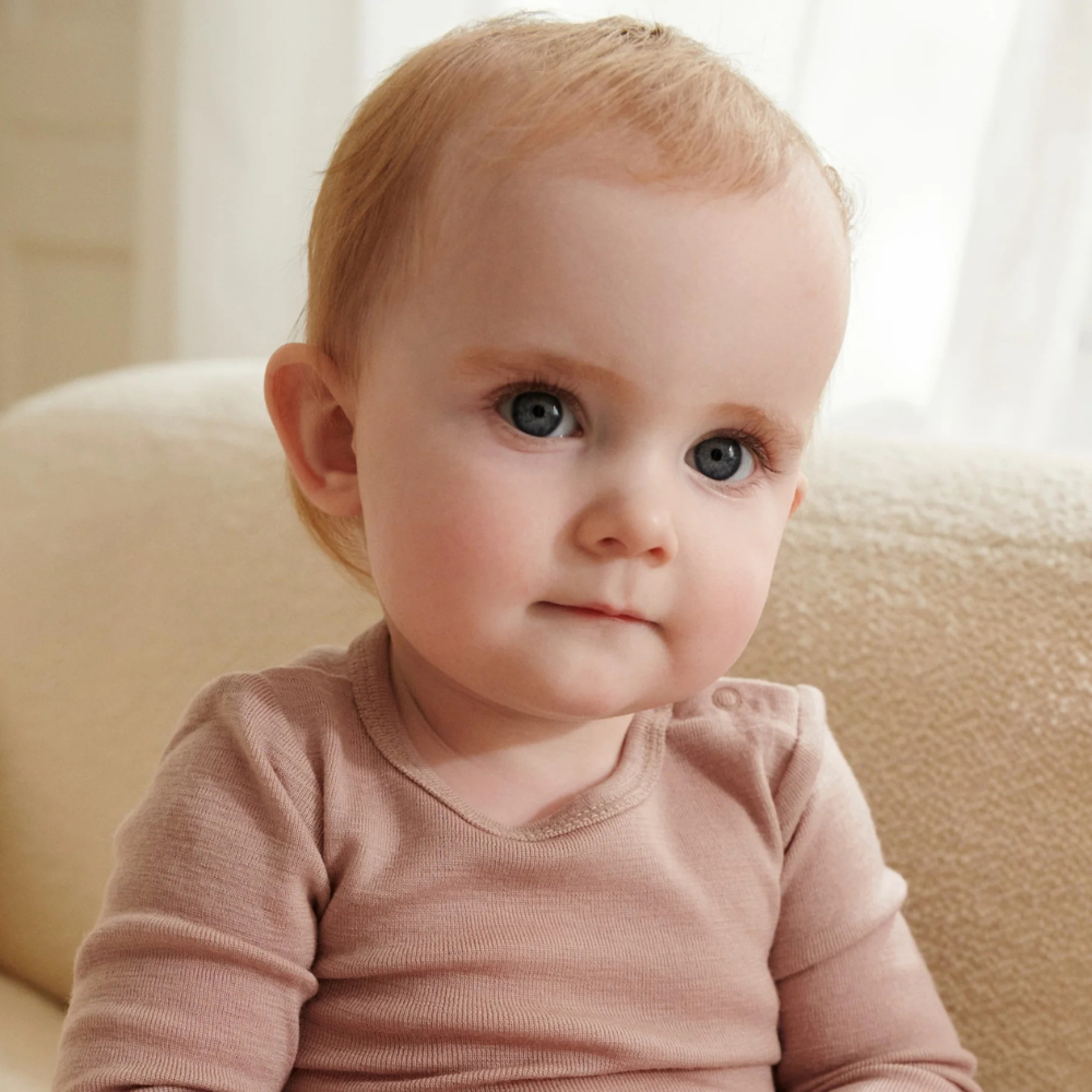 Wheat Body niemowlęce z długim rękawem z wełny merino Lucca dry rose