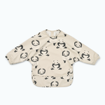 Liewood Śliniak z rękawkami i kieszonką Merle Panda / Sandy