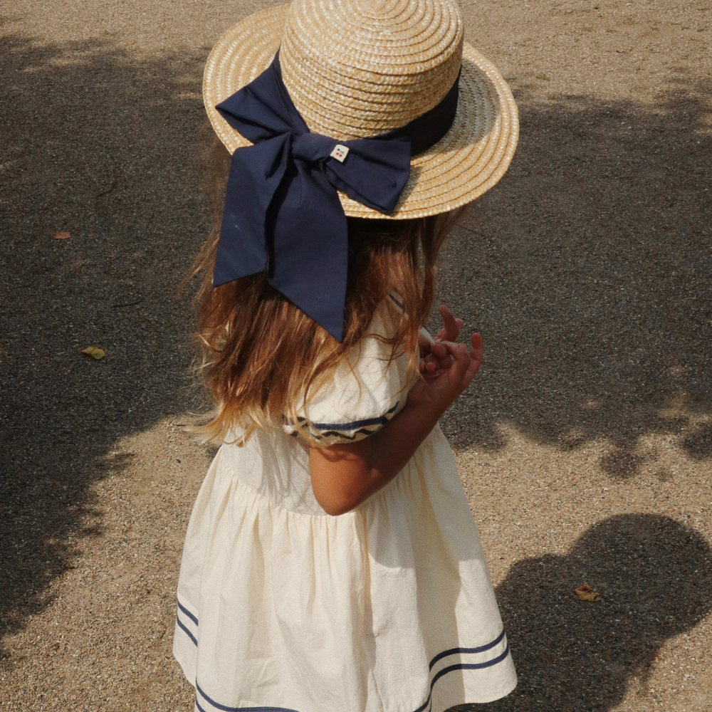 Konges Slojd Słomiany kapelusz z kokardą Allie Sailor Hat Navy blazer
