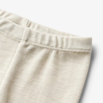 Wheat wełniane legginsy dziecięce Agi eggshell melange