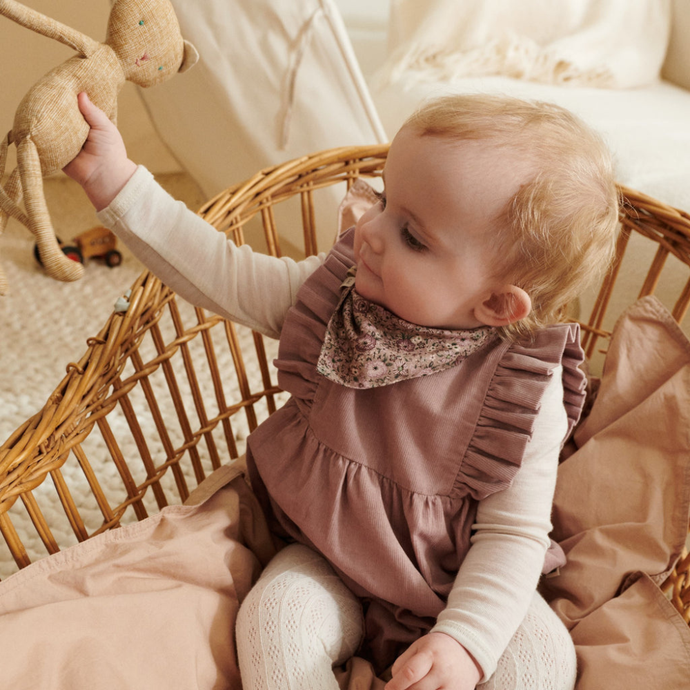 Wheat wełniane body dziecięce z długim rękawem Lucca eggshell melange